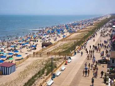 Aerial view of the Rehoboth Beach Boardwalk filled with people